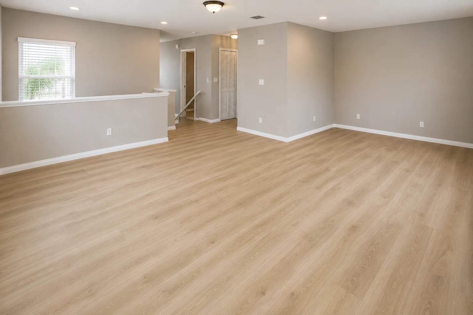 Wide-plank luxury vinyl flooring after installation by SAVAM House