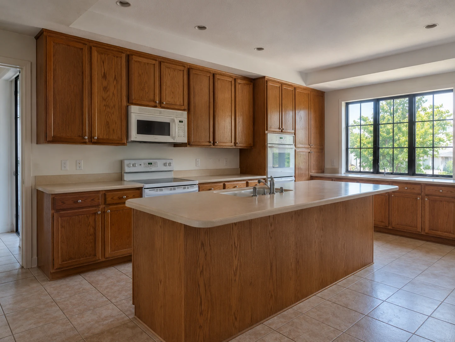 Closed-off, dated kitchen before renovation