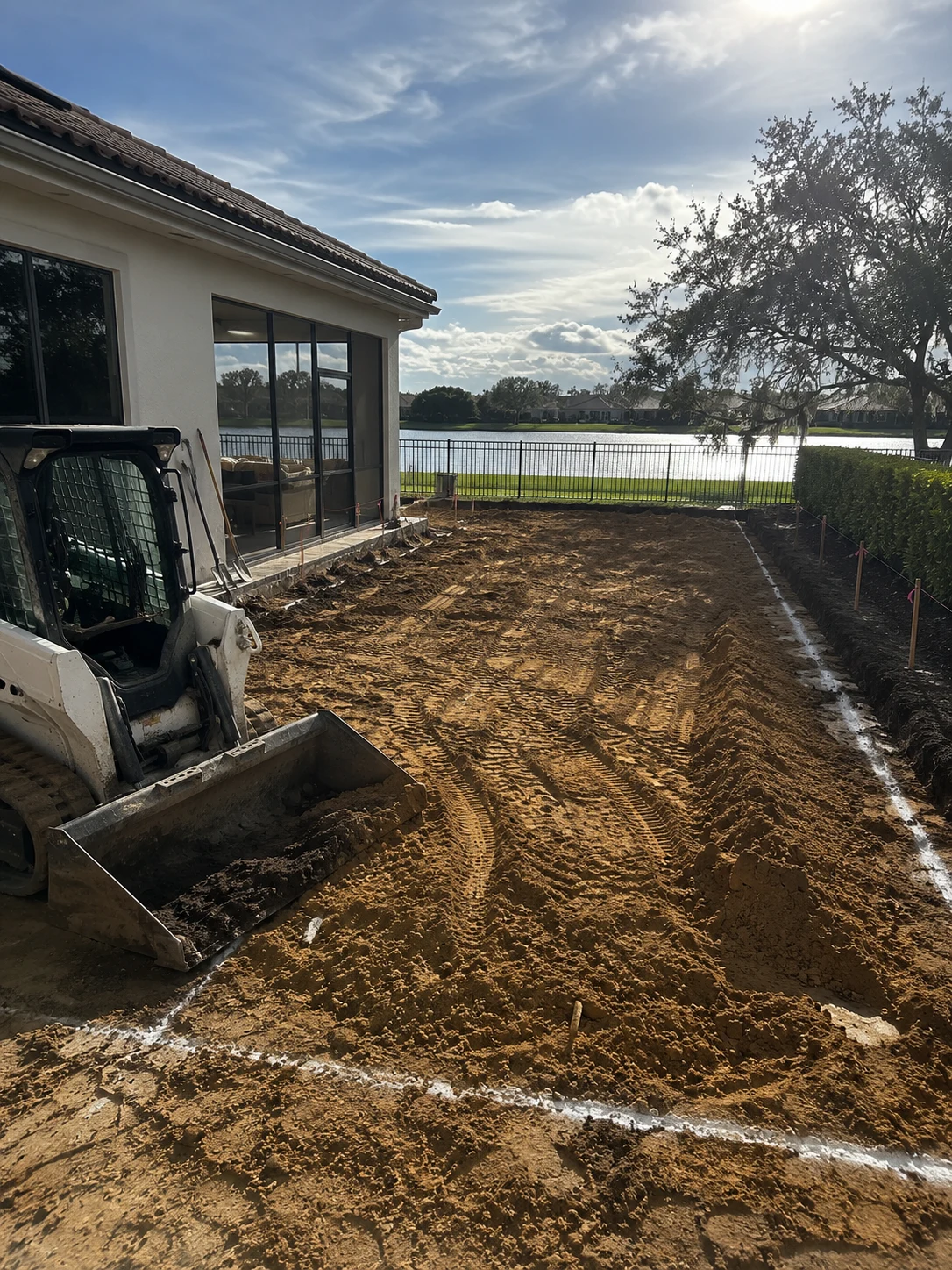 Site preparation and grading for an outdoor living project by SAVAM House