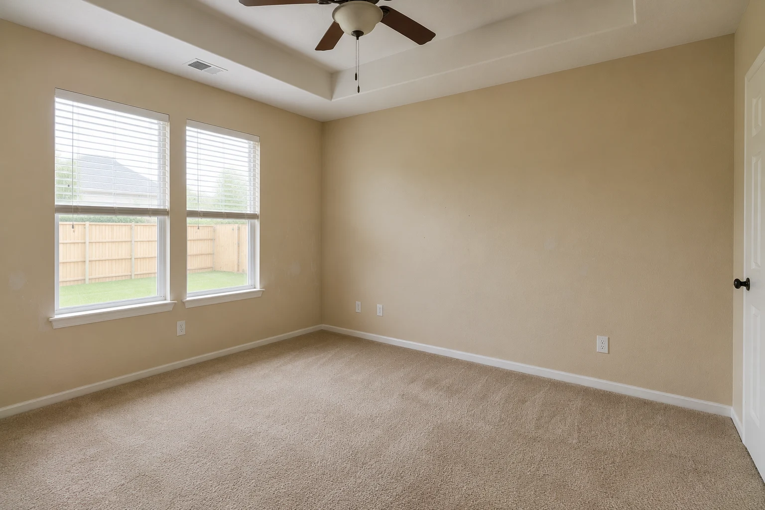 Scuffed and unevenly painted interior walls before repainting